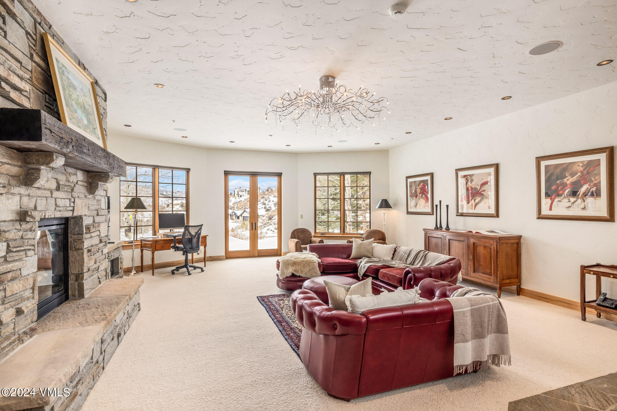 319 Granada Glen Road Edwards, CO 81632 - Photo 26 of 43 a living room with furniture and a fireplace