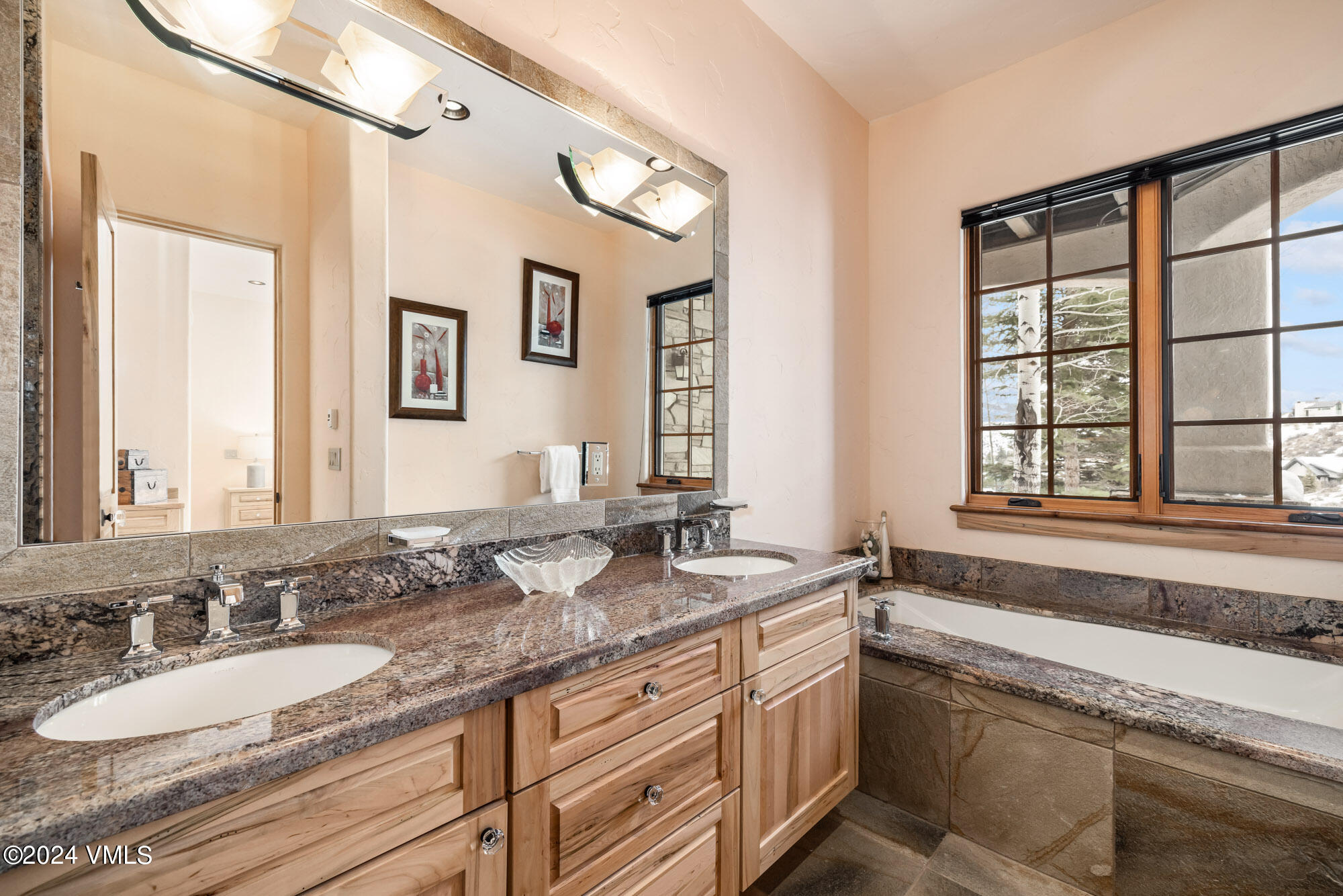 319 Granada Glen Road Edwards, CO 81632 - Photo 32 of 43 a bathroom with a granite countertop sink and a large mirror