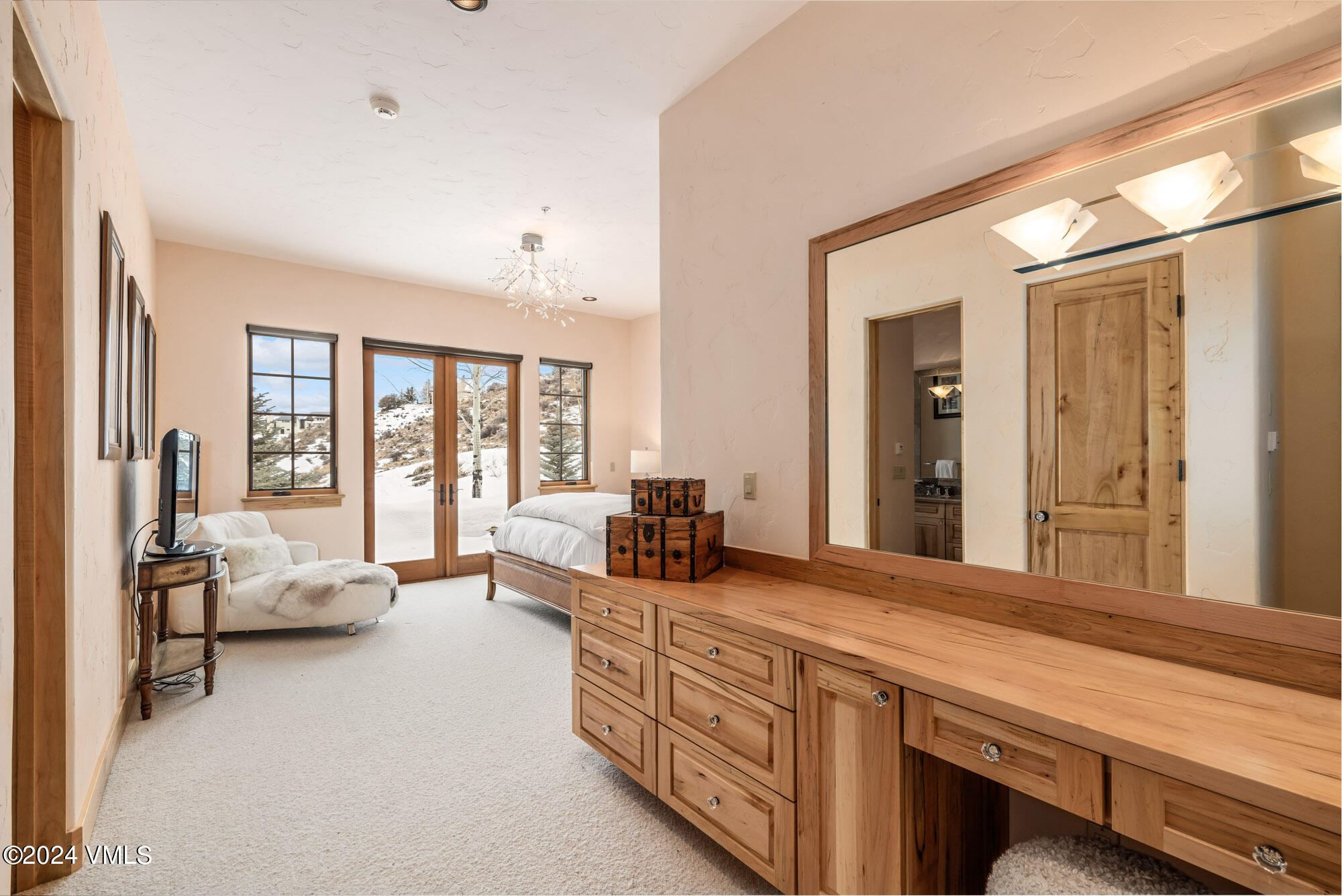 319 Granada Glen Road Edwards, CO 81632 - Photo 33 of 43 a spacious en suite bathroom with double vanity and a large mirror