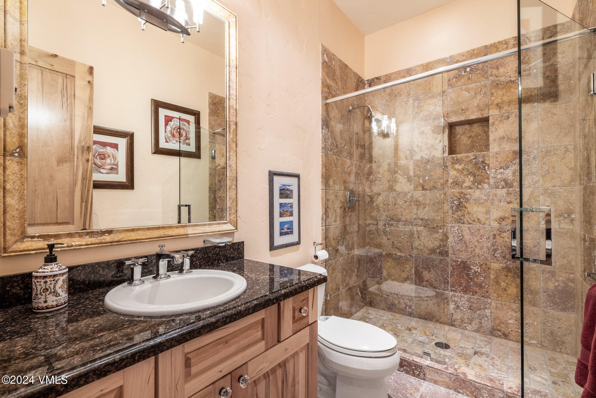 319 Granada Glen Road Edwards, CO 81632 - Photo 36 of 43 a bathroom with a sink and a mirror