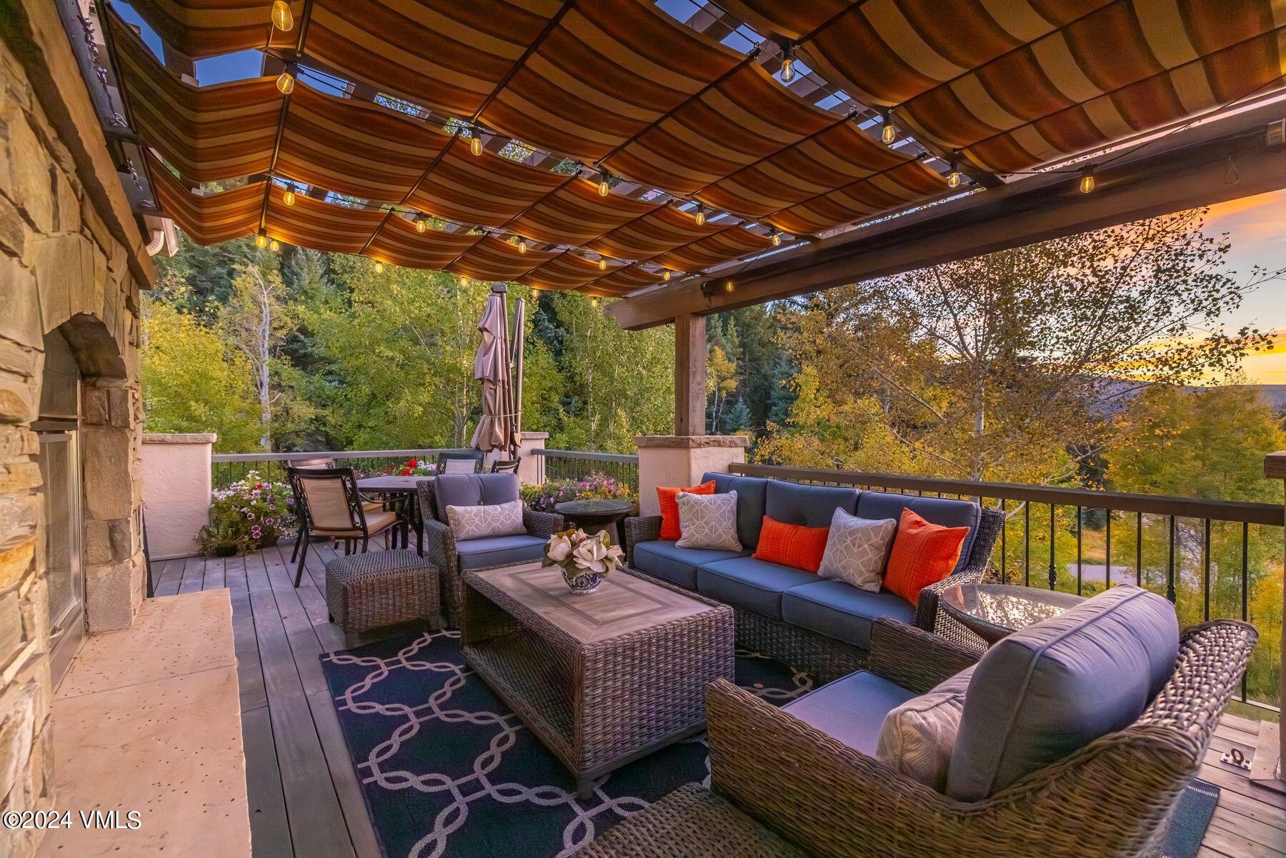 319 Granada Glen Road Edwards, CO 81632 - Photo 42 of 43 a outdoor living space with furniture and a fireplace