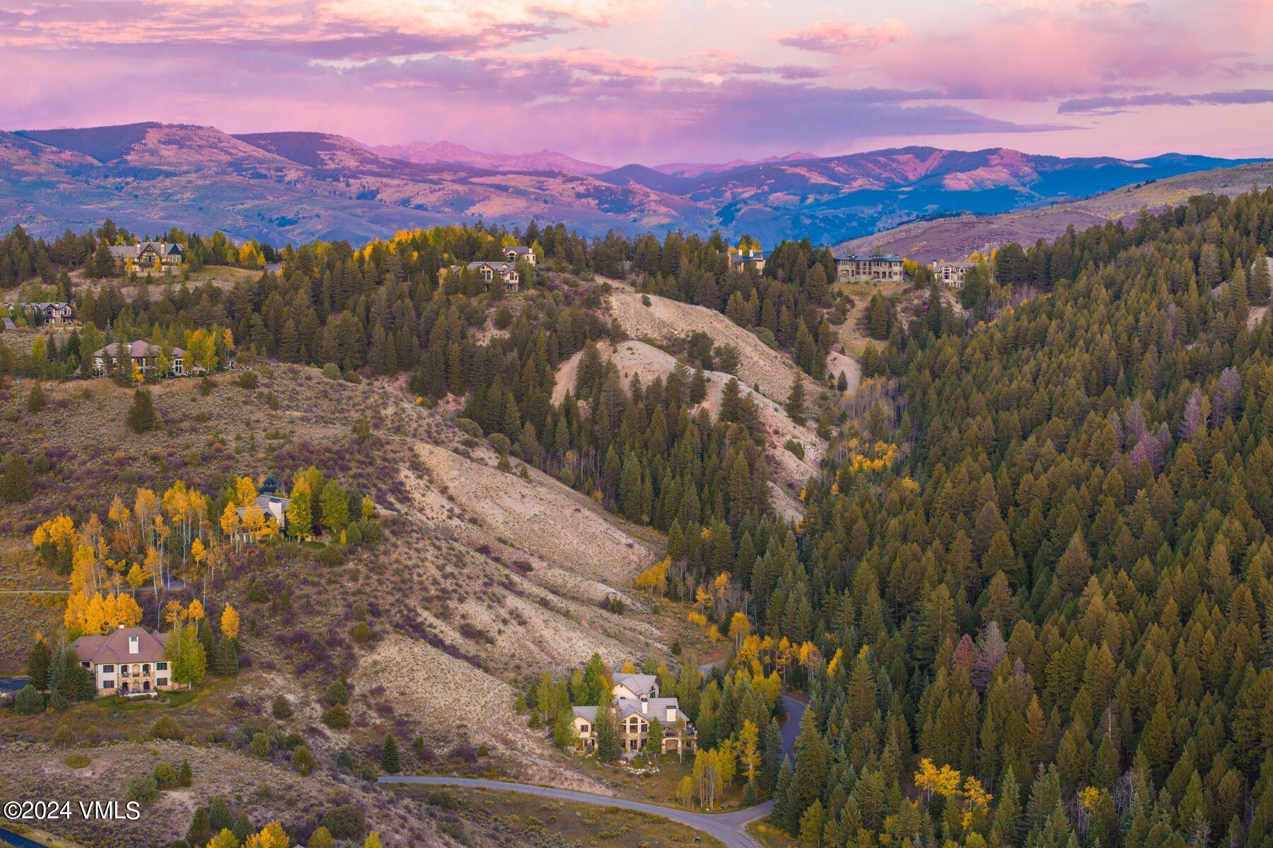 319 Granada Glen Road Edwards, CO 81632 - Photo 43 of 43 a view of a city with sunset