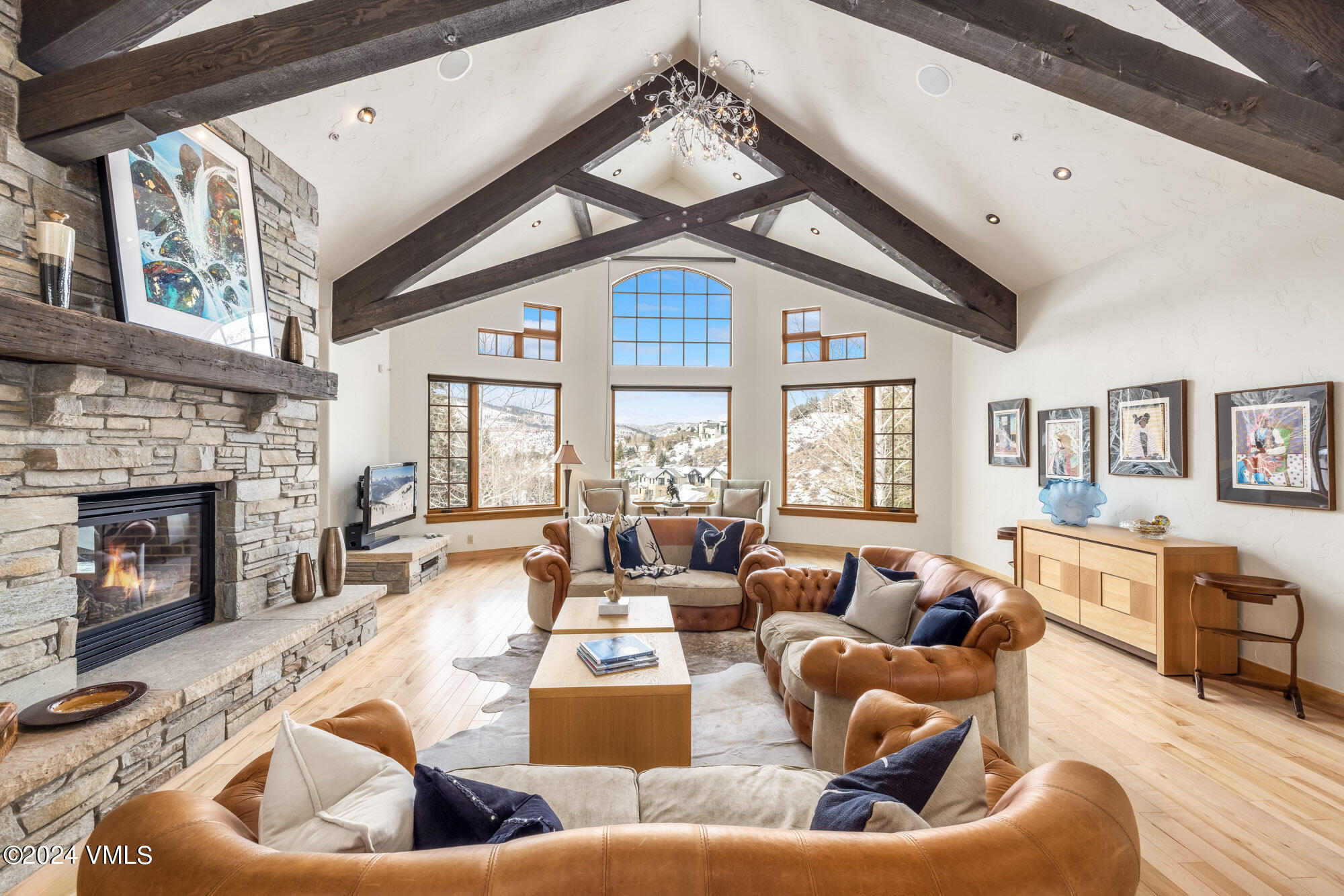 319 Granada Glen Road Edwards, CO 81632 - Photo 6 of 43 a living room with furniture fireplace and a large window