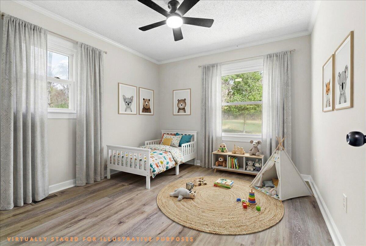 133 Starling Lane Callaway, VA 24067 - Photo 25 of 56 a bed room with a bed and a window