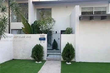 a view of a house with a garden