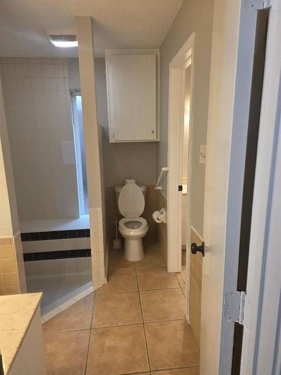 Undisclosed Address Hurst, TX 76054 - Photo 14 of 29 ENTRY TO BATH FROM HALLWAY OR BEDROOM