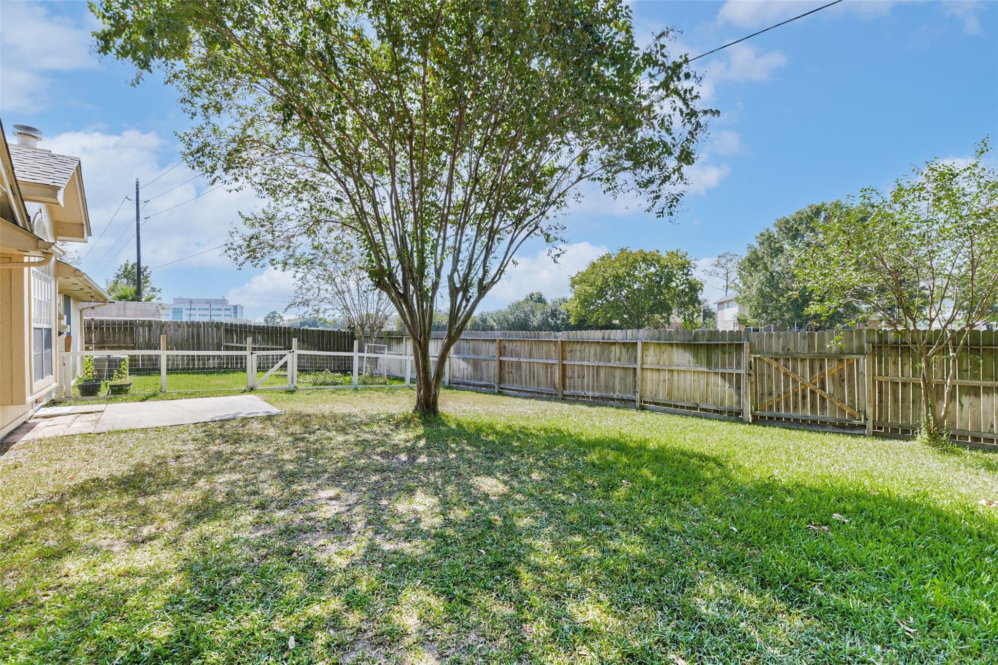 15027 Winding Black Cherry Lane Cypress, TX 77433 - Photo 32 of 37 a view of a house with a yard