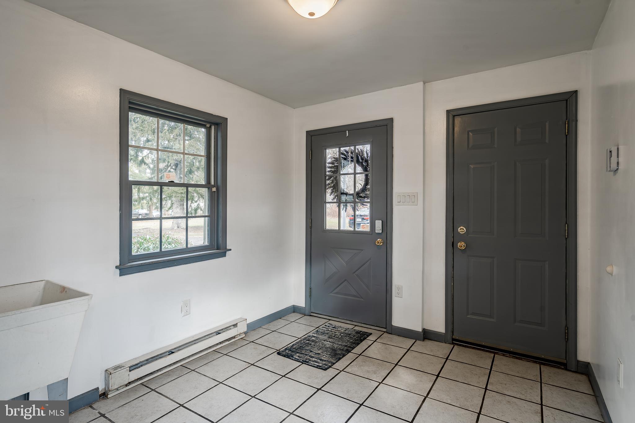 824 Swedesford Road Ambler, PA 19002 - Photo 32 of 72 True Mud Room off the side door, garage, rear yard
