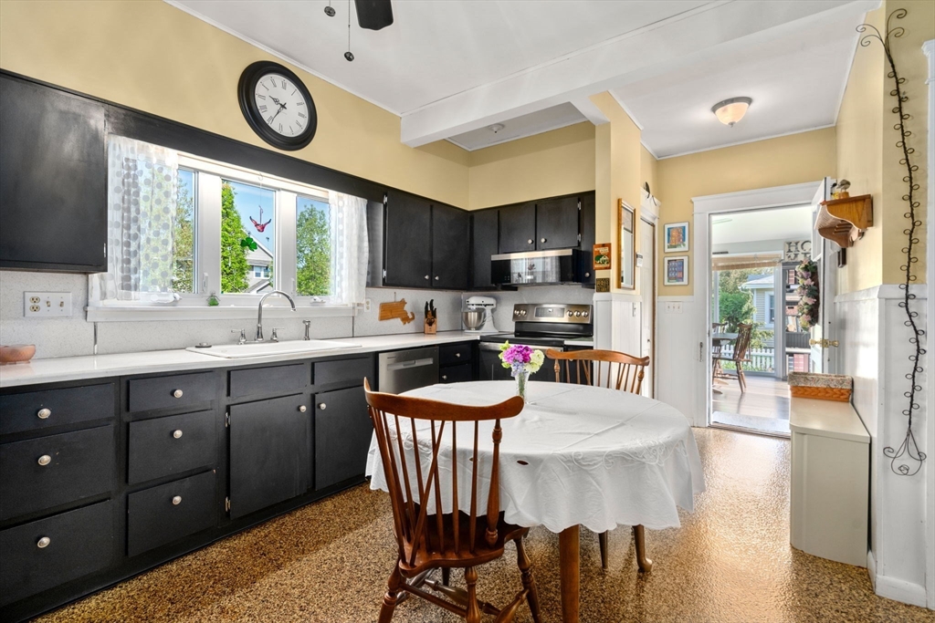 1 Brighton Road Worcester, MA 01606 - Photo 14 of 30 a large kitchen with a table and chairs in it
