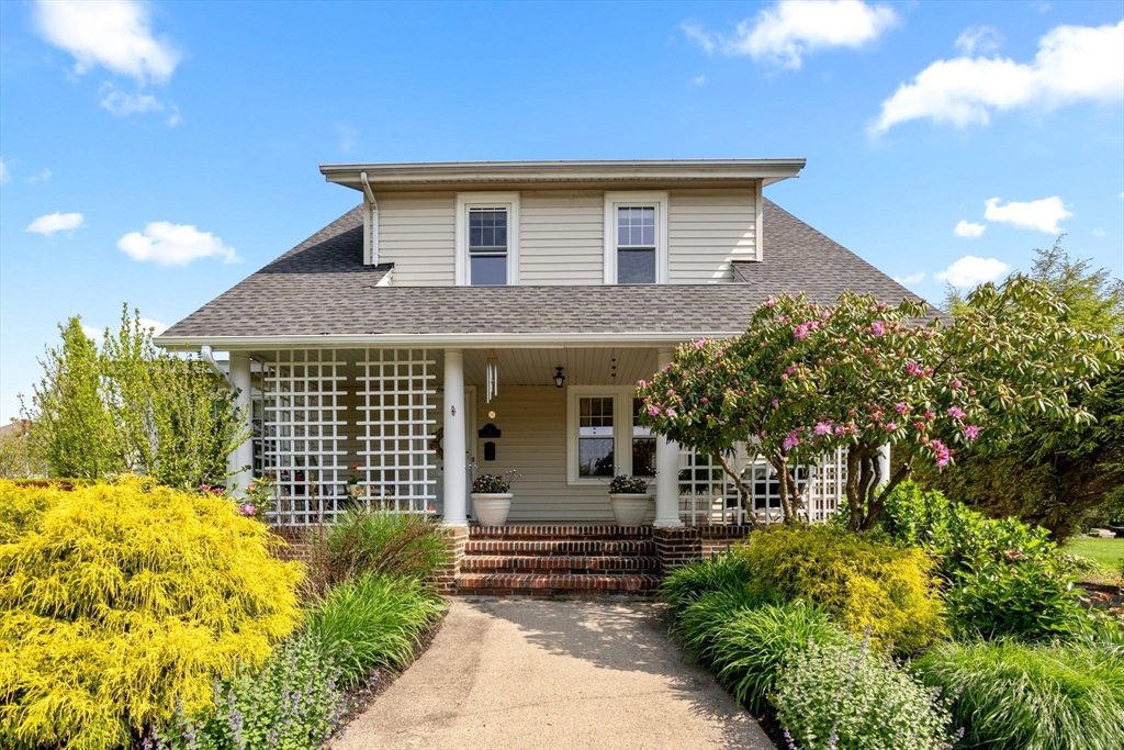 1 Brighton Road Worcester, MA 01606 - Photo 4 of 30 a front view of a house with a garden