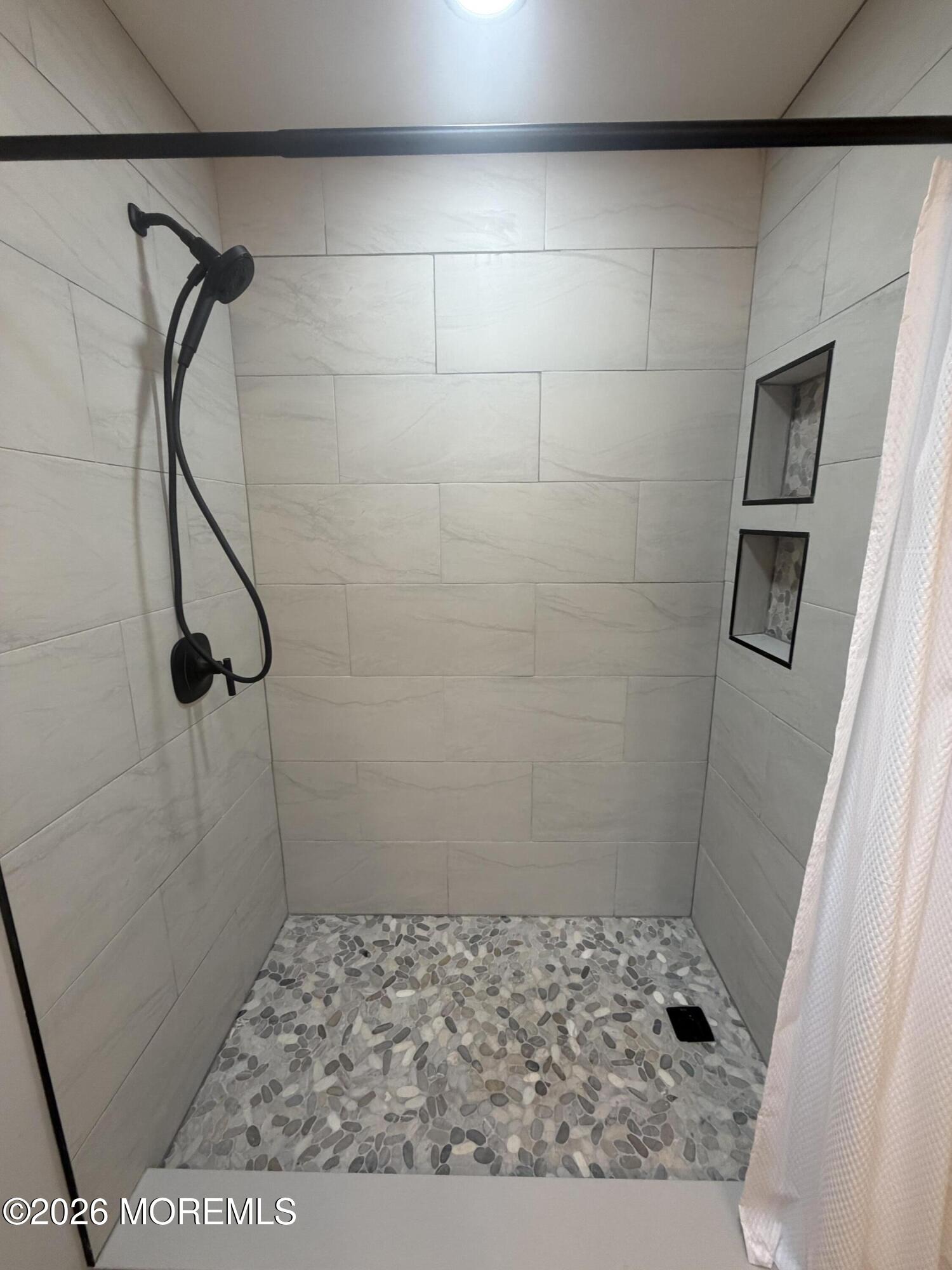 31 Homestead Drive, Unit A Whiting, NJ 08759 - Photo 20 of 23 a bathroom with a shower