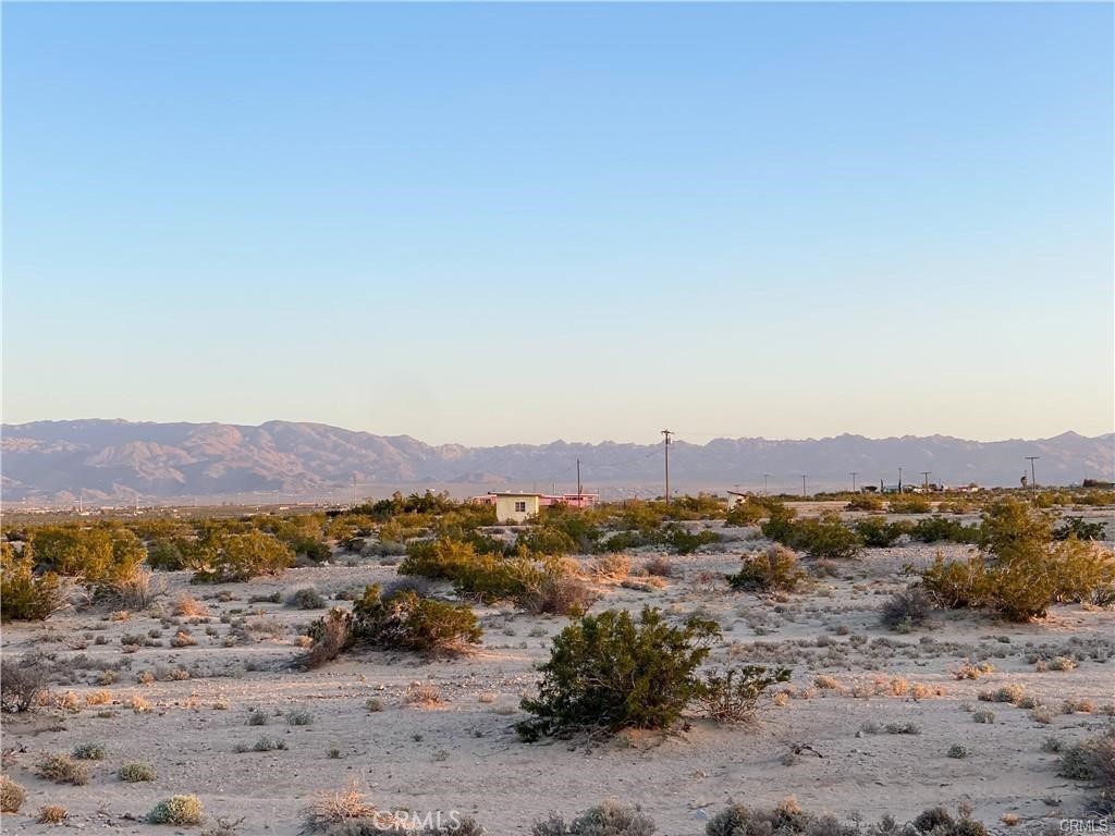 0 Pole Line Road Twentynine Palms, CA 92277 - Photo 12 of 12 an aerial view of mountain with residential house and mountain view