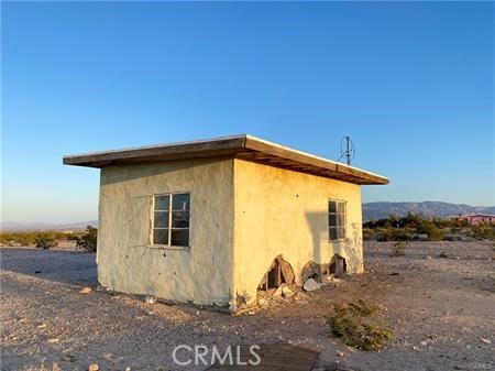0 Pole Line Road Twentynine Palms, CA 92277 - Photo 7 of 12 a view of a house with a backyard
