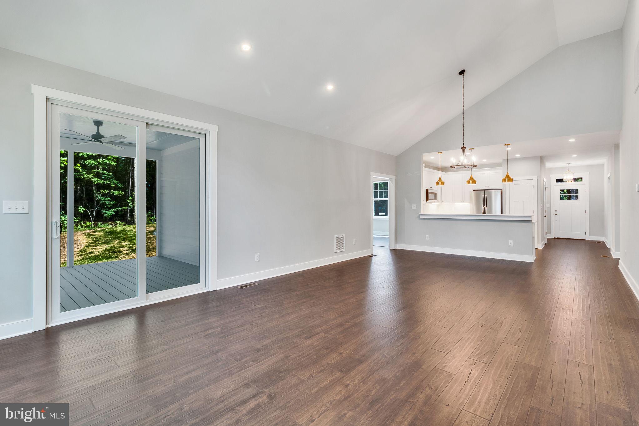 57 Waterman's Way Reedville, VA 22539 - Photo 13 of 43 Great Room easy access to screen porch & outdoors