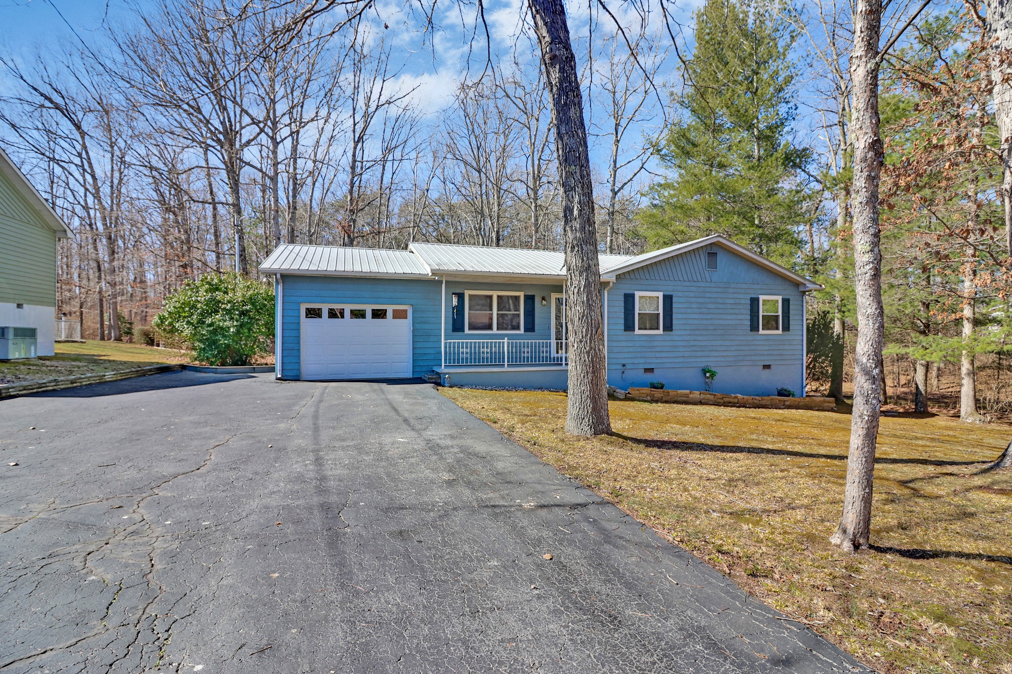 front view of a house with a yard