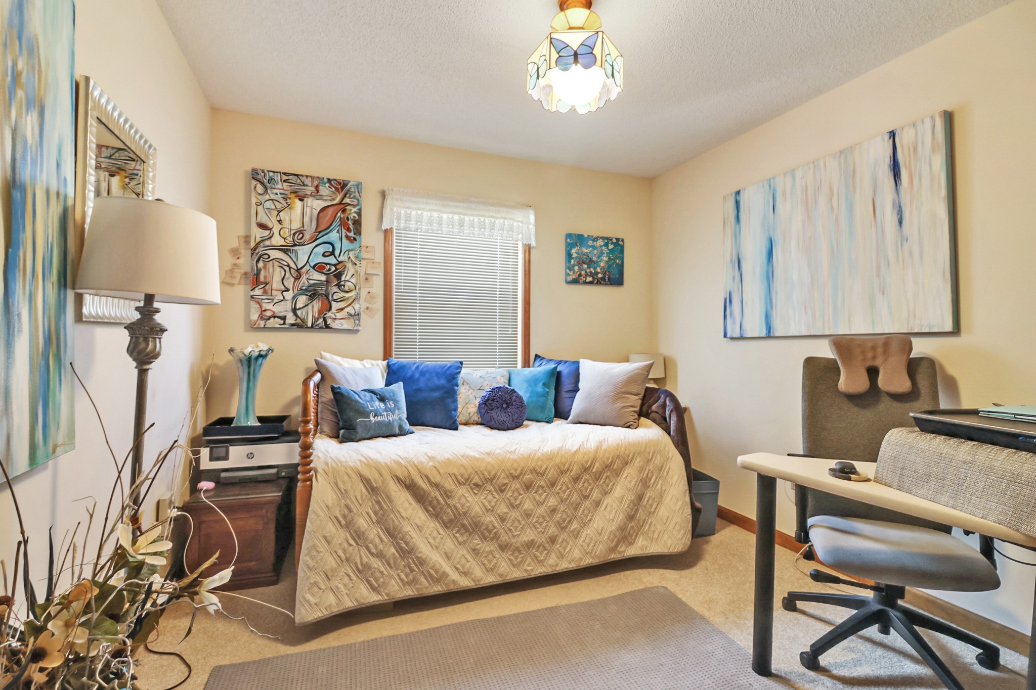 262 Mockingbird Drive Crossville, TN 38555 - Photo 19 of 41 a bedroom with a bed and a chandelier