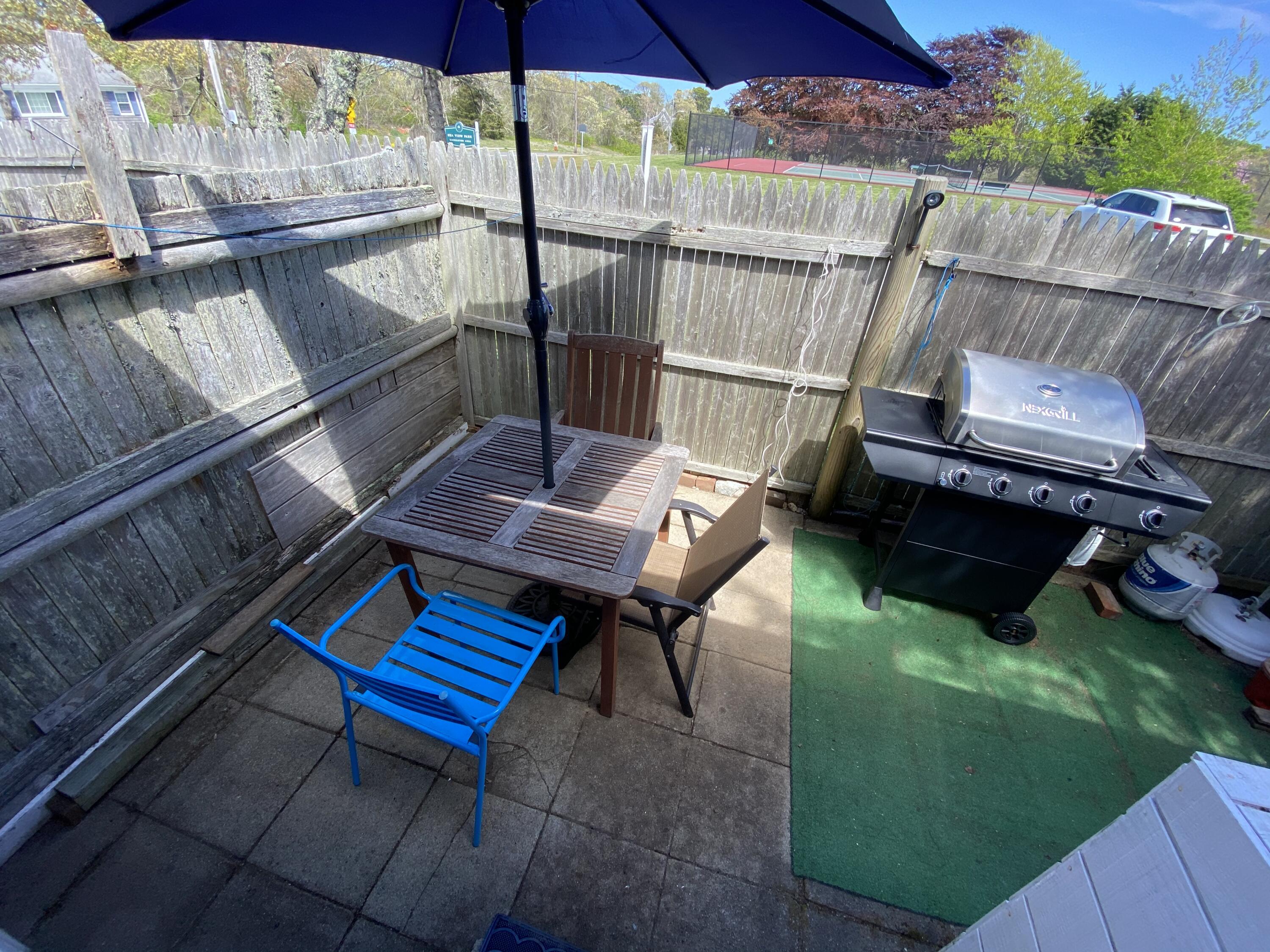465 Lower County Road, Unit 3A Dennis Port, MA 02639 - Photo 25 of 33 a view of deck with patio