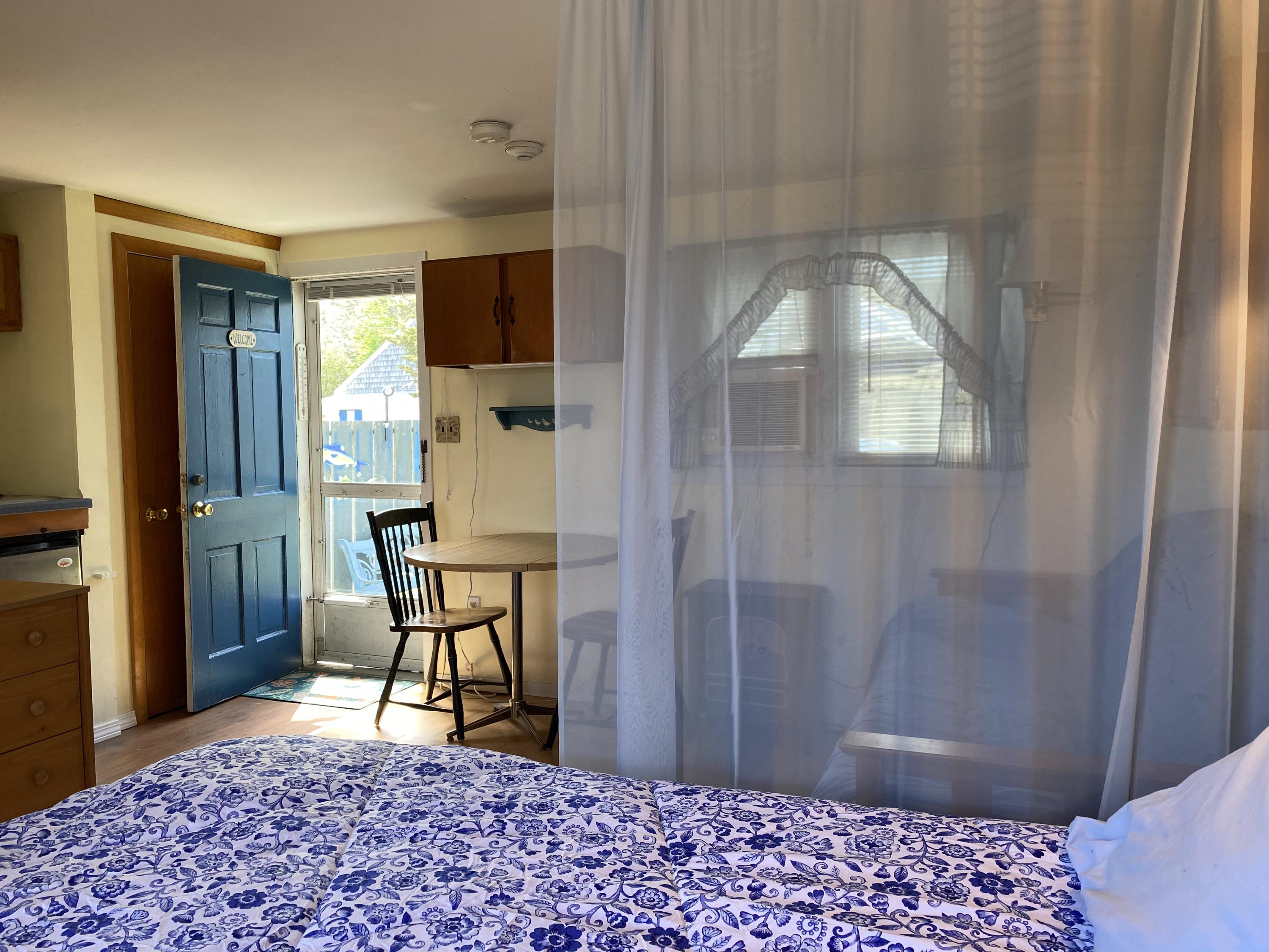 465 Lower County Road, Unit 3A Dennis Port, MA 02639 - Photo 7 of 33 a view of a livingroom with furniture and front door