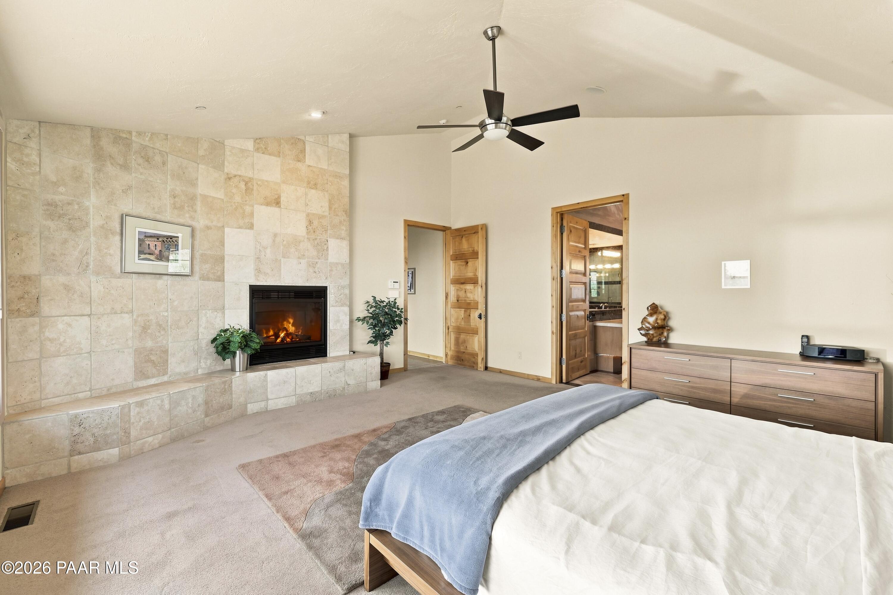 2148 Forest Mountain Road Prescott, AZ 86303 - Photo 20 of 62 Primary Bedroom wgas fireplace