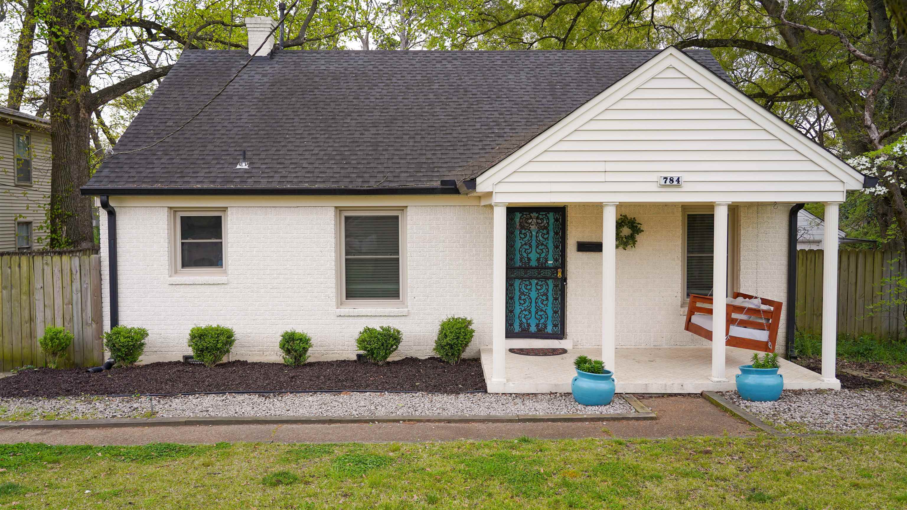 784 Vaughn Road Memphis, TN 38122 - Photo 1 of 28 a front view of a house with a yard