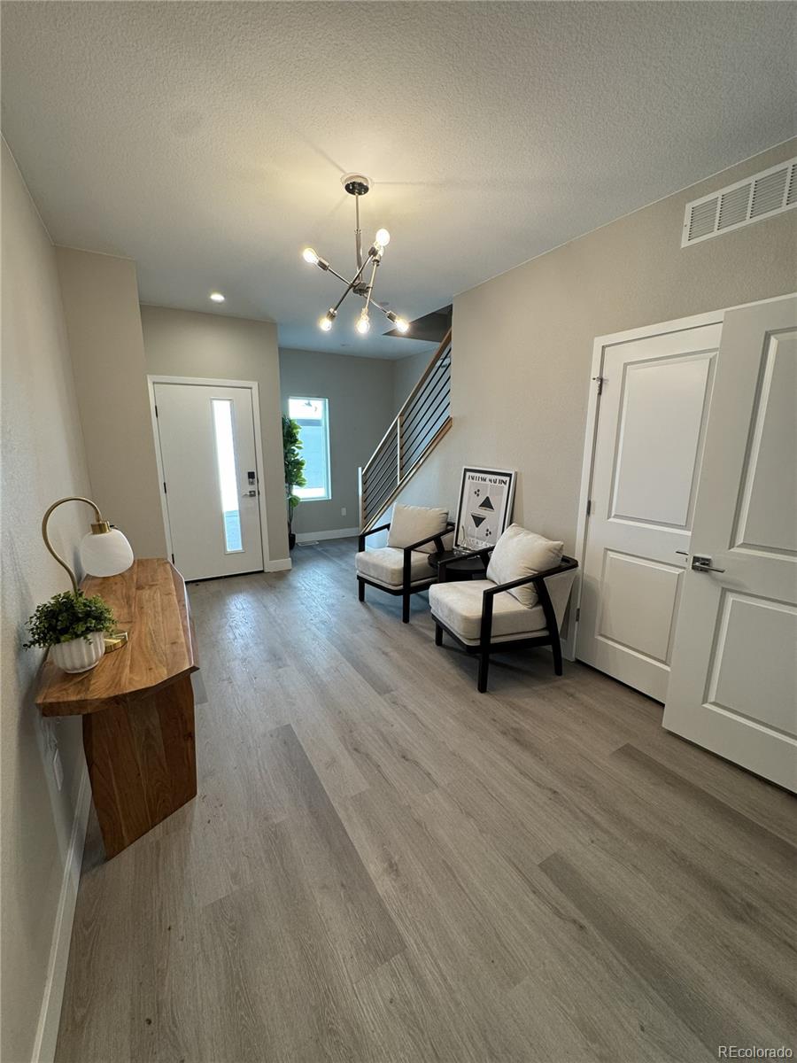 2660 South Delaware Street, Unit 9 Denver, CO 80223 - Photo 14 of 19 a living room with furniture