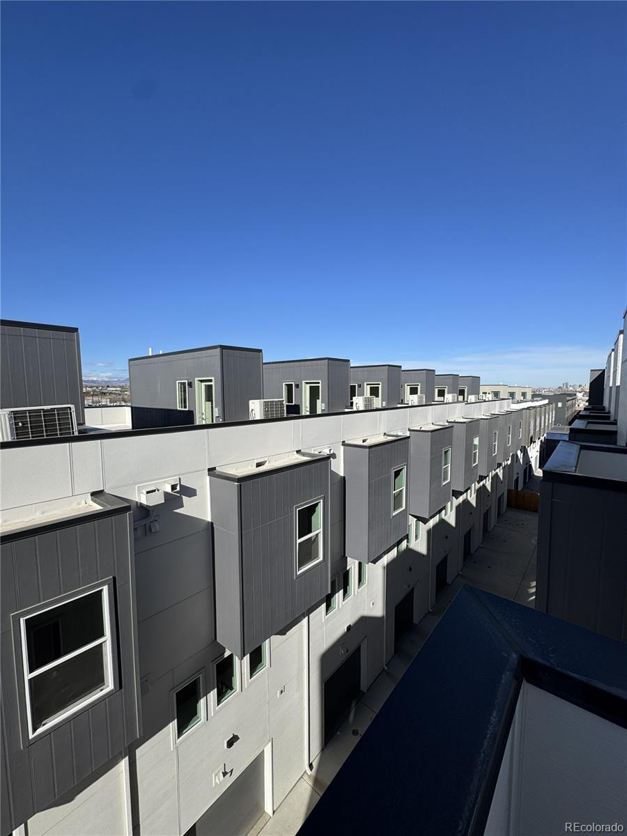 2660 South Delaware Street, Unit 9 Denver, CO 80223 - Photo 19 of 19 a view of a terrace with chairs