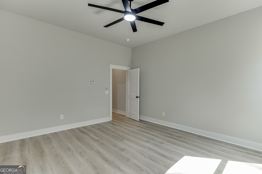 115 Rains Road Jefferson, GA 30549 - Photo 29 of 44 a view of an empty room and window
