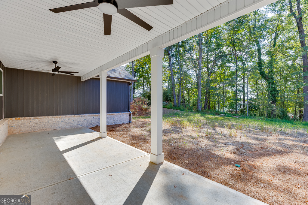 115 Rains Road Jefferson, GA 30549 - Photo 38 of 44 a backyard of a house with lots of green space