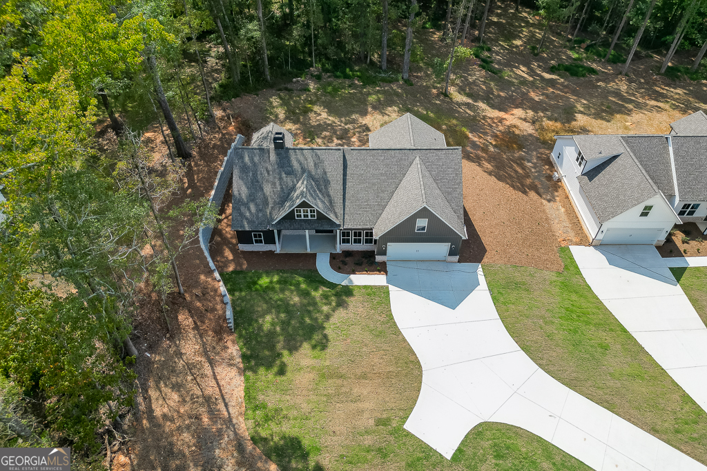 115 Rains Road Jefferson, GA 30549 - Photo 42 of 44 an aerial view of a house with swimming pool and large trees