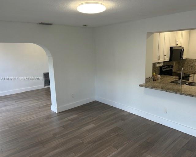 231 Southwest 51st Place Miami, FL 33134 - Photo 14 of 26 a view of a livingroom with wooden floor