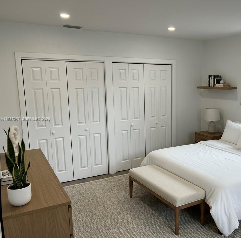 231 Southwest 51st Place Miami, FL 33134 - Photo 7 of 26 a bedroom with a bed and a couch