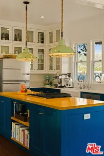 a bathroom with a sink mirror and a bathtub