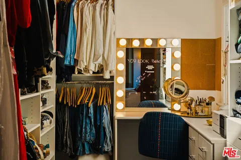a view of a house with basketball court