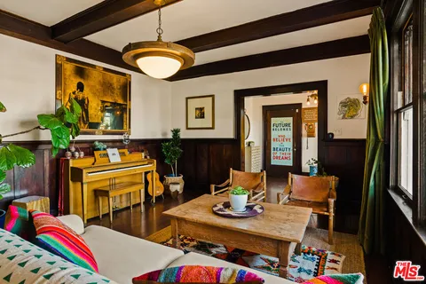 a kitchen that has a lot of cabinets in it