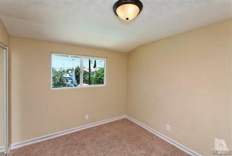 1391 Lowery Street Simi Valley, CA 93065 - Photo 11 of 16 an empty room with windows