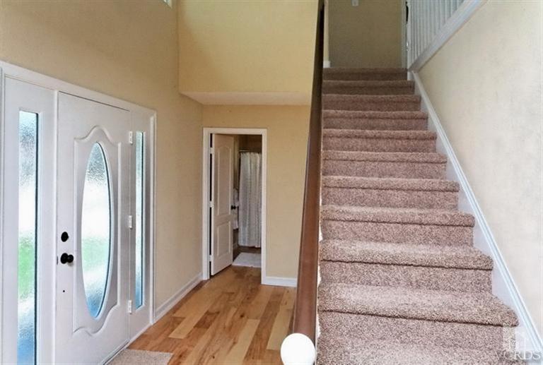 1391 Lowery Street Simi Valley, CA 93065 - Photo 3 of 16 a view of an entryway with staircase