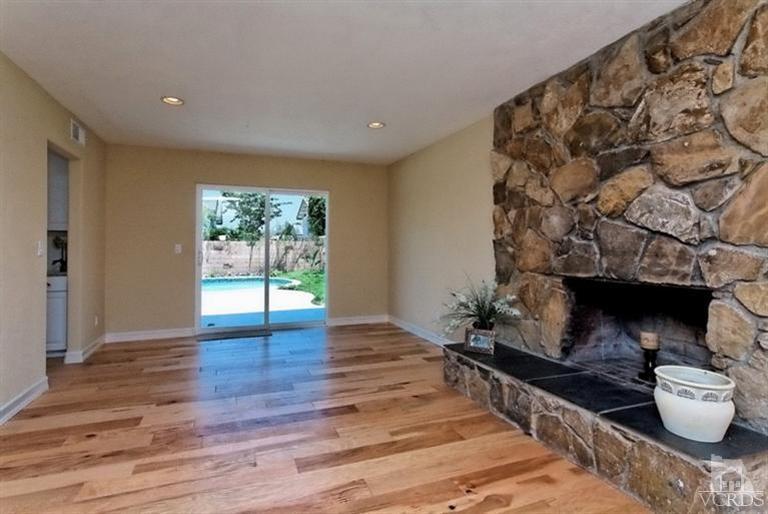 1391 Lowery Street Simi Valley, CA 93065 - Photo 6 of 16 a living room with furniture and a fireplace