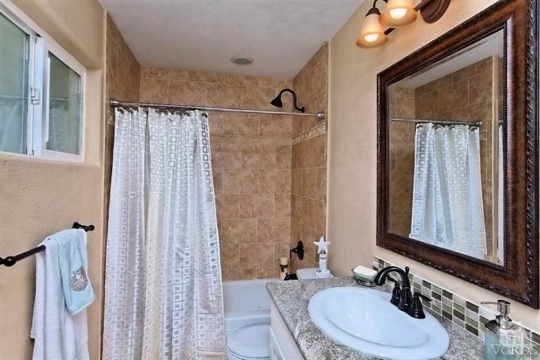 1391 Lowery Street Simi Valley, CA 93065 - Photo 10 of 16 a bathroom with a sink double vanity and a mirror