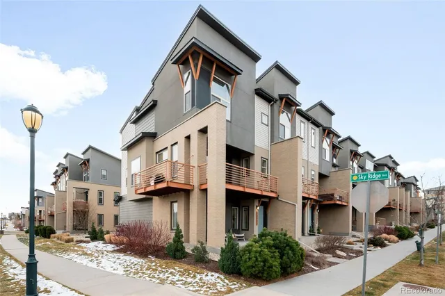 a view of a street with buildings