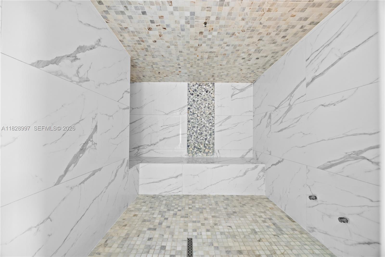 50 Biscayne Boulevard, Unit 4706 Miami, FL 33132 - Photo 49 of 49 a bathroom with a shower