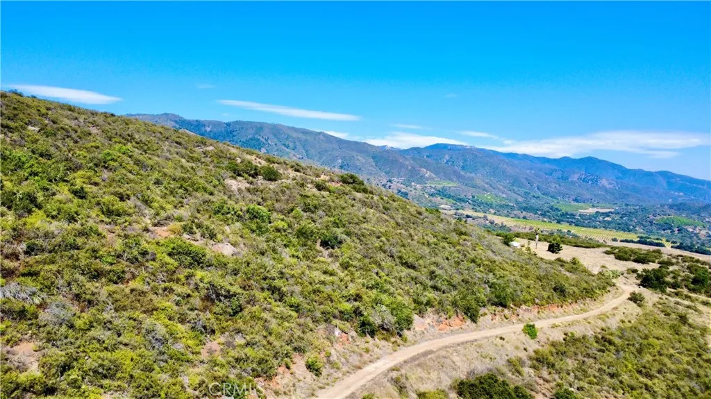 0 Sunset Peak Valley Center, CA 92082 - Photo 12 of 17 a view of a large mountain with mountains in the background