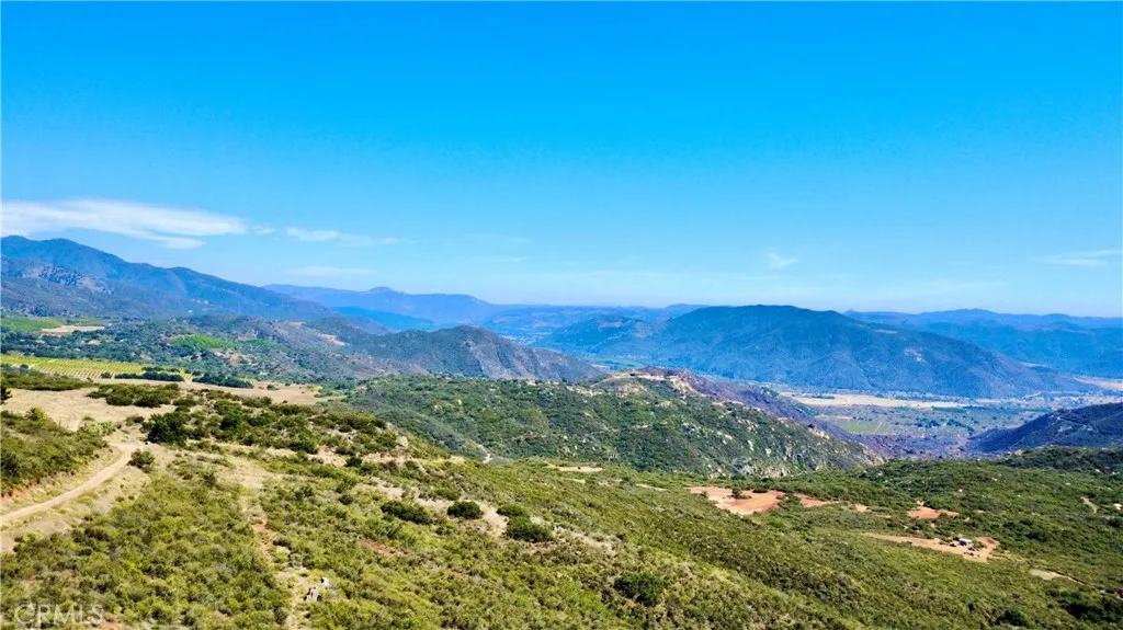 0 Sunset Peak Valley Center, CA 92082 - Photo 13 of 17 a view of mountain with an ocean