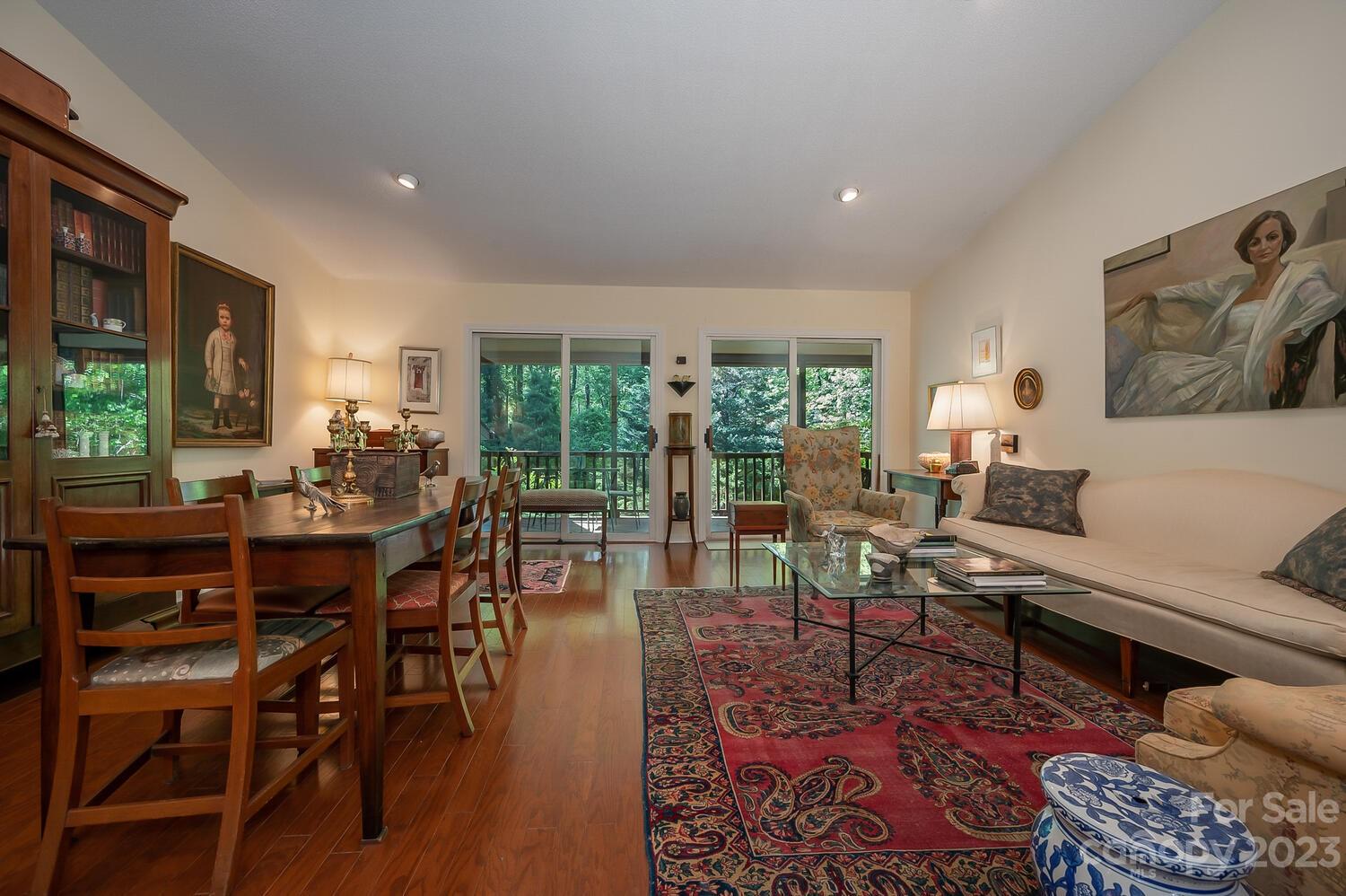 41 Hunting Country Trail, Unit 41 Tryon, NC 28782 - Photo 6 of 34 a living room with furniture and a large window