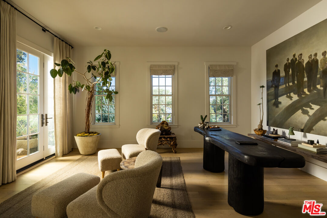 664 Elkins Road Los Angeles, CA 90049 - Photo 15 of 40 a living room with furniture and wooden floor