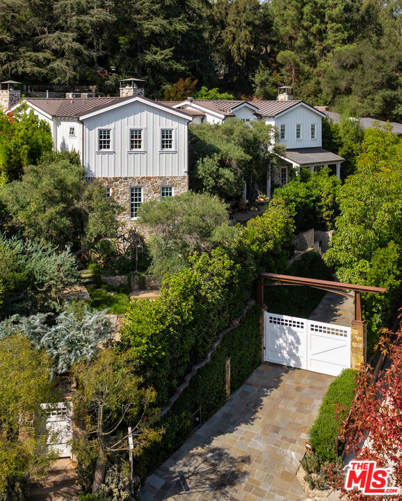 664 Elkins Road Los Angeles, CA 90049 - Photo 2 of 40 a view of a back yard