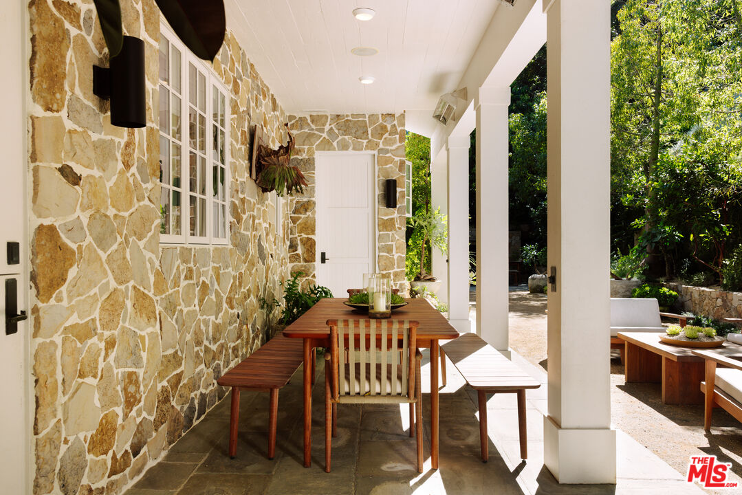 664 Elkins Road Los Angeles, CA 90049 - Photo 32 of 40 a view of a balcony with chairs