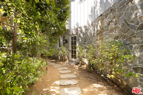 a view of house with yard