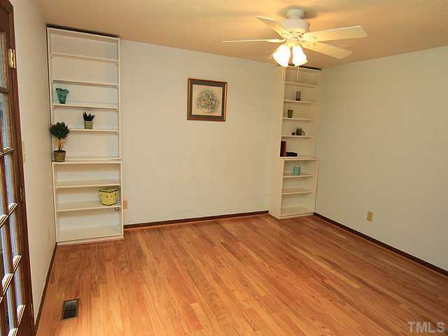 8728 Danbury Circle Raleigh, NC 27613 - Photo 14 of 25 Huge Master Bedroom with built in shelving and amazing walk in closet.