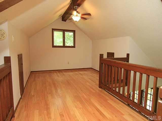 8728 Danbury Circle Raleigh, NC 27613 - Photo 17 of 25 New hardwoods in the great space. Complete with dual ceiling fans and natural lighting.