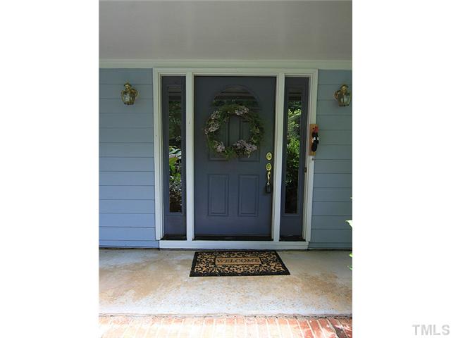 8728 Danbury Circle Raleigh, NC 27613 - Photo 2 of 25 Welcome home! large covered porch, both warm and inviting.